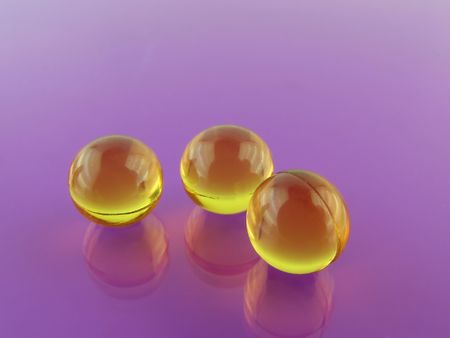yellow pills on glossy background, macroの写真素材