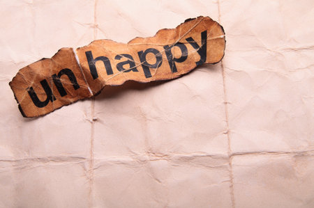 Word unhappy transformed into happy. Motivationの写真素材