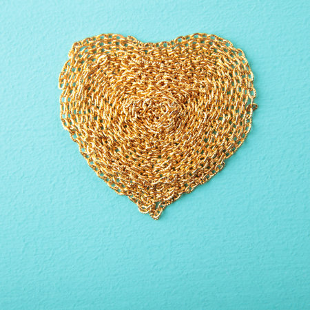 Heart made with gold chain wood texture