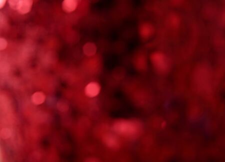 Red holiday bokeh. Abstract Christmas backgroundの写真素材