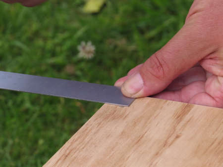 measuring wood ready to cutの写真素材