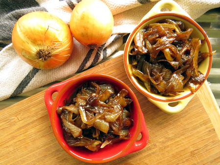 Home made caramelised onion in colourful bowlsの写真素材