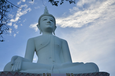 Large buddha statue with blue sky in Thailand.の写真素材
