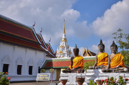 Three Buddha statues at Phrathat Chaiya temple,southern in Thailandの写真素材
