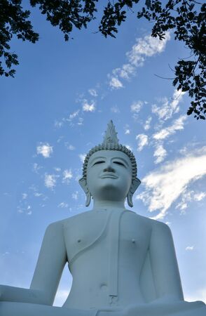 Large buddha statue with blue sky in Thailand.の写真素材