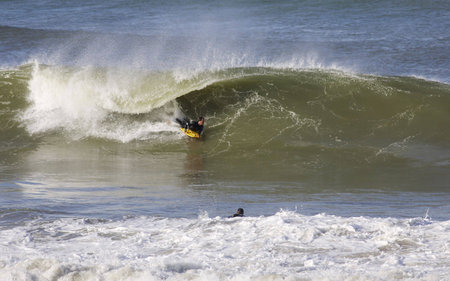 good bodyboarder on a powerful wave in Anglet ( France)の写真素材