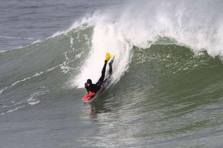 body boarder in action on a powerful wave in Anglet ( france )の写真素材
