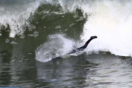surfer riding a waveの写真素材