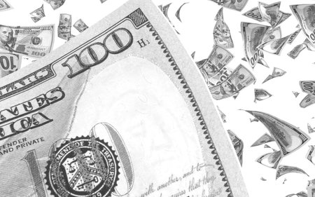 Flying dollars banknotes isolated on white background. Money is flying in the air. 100 US banknotes...