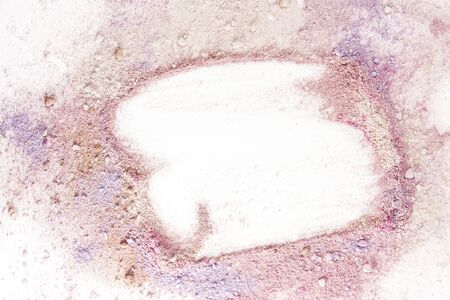 Abstract background texture with vibrant pink makeup powder, shot from above, forming a frame for copyspaceの写真素材