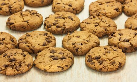 A closeup of a pile of chocolate chips cookies, selective focusの写真素材