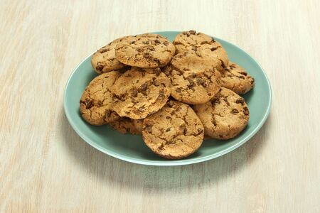 Chocolate chips cookies on plate with copyspaceの写真素材