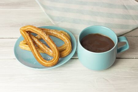 Churros with chocolate, traditional Spanish breakfastの写真素材