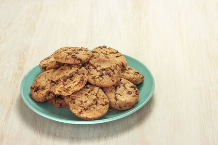 Chocolate chips cookies on plate with copyspaceの写真素材