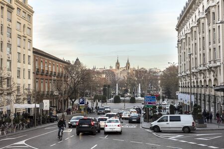 Cars moving along Paseo del Prado in Madrid, Spainのeditorial素材
