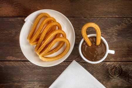 Photo of churros con chocolate, traditional Spanish dessertの写真素材
