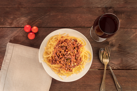 Plate of pasta with meat and tomato sauceの写真素材