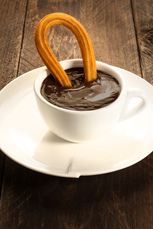 Photo of churros con chocolate, traditional Spanish dessertの写真素材