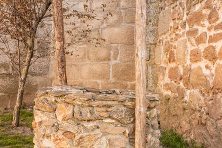 A toned photo of an old stone water well in Spainの写真素材