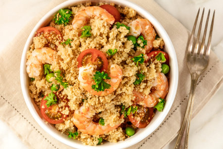 Overhead photo of shrimp and vegetable coucous dishの写真素材