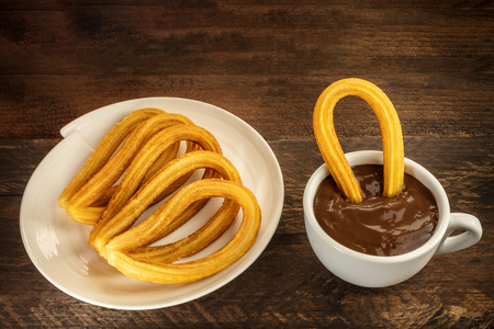 Photo of churros con chocolate, traditional Spanish dessertの写真素材
