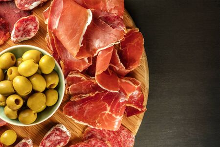Overhead photo of Spanish cold meats platter with copyspaceの写真素材