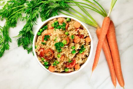Overhead photo of vegetable coucous dish with fresh carrotsの写真素材