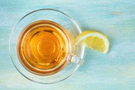 Cup of tea with lemon wedge and copy spaceの写真素材