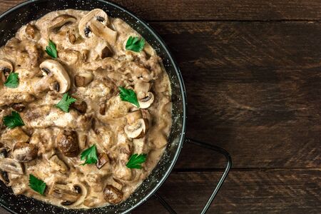 Mushroom beef stroganoff in pan with copy spaceの写真素材