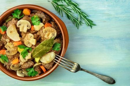 Overhead photo of meat and mushrooms ragout with copyspaceの写真素材