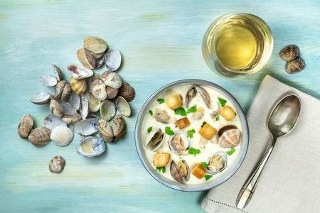 Bowl of clam chowder soup, overhead shot, with copy spaceの写真素材