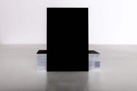 Black business card mockup on a light backgroundの写真素材