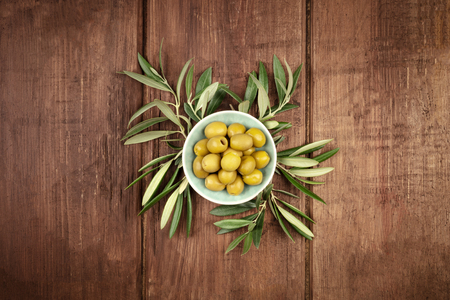 Overhead photo of olives in a bowl with copy spaceの写真素材