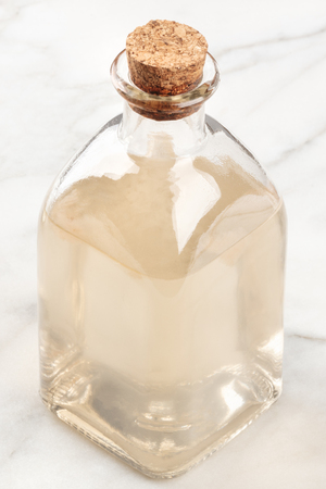 A photo of a corked bottle of a homemade face tonicの写真素材