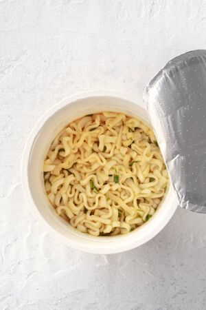 Plastic cup of instant ramen noodles, shot from above with copy spaceの写真素材
