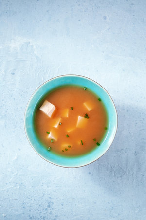 Miso soup with tofu and green onions, shot from above with copyspaceの写真素材