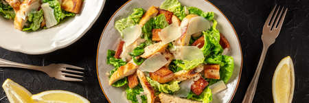 Chicken Caesar salad overhead flat lay panoramaの写真素材