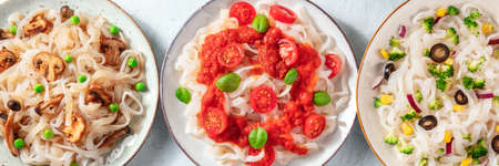 Konjac pasta panorama. Fettuccine with various vegetable toppingsの写真素材