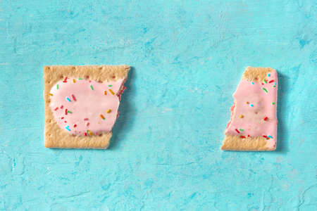 tart, broken, overhead flat lay shot on a blue backgroundの写真素材