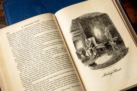 Madrid, Spain - August 11, 2021: A Christmas Carol by Charles Dickens, the classic winter reading, a vintage edition with an illustration of Marleys ghostのeditorial素材