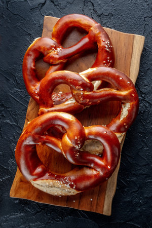 Pretzel or Bretzel, traditional German beer snack, a salty wheat bread, shot from the top on a...