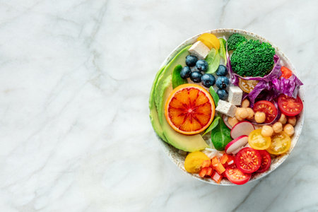 Buddha Bowl. Rainbow salad. Vegan poke bowl with avocado. Healthy food. Overhead flat lay shot with a place for textの写真素材
