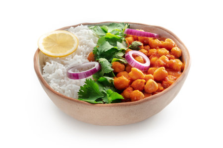 Chana masala, chickpea curry, traditional Indian dish, isolated on a white backgroundの写真素材