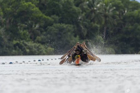 Songkhla,  Thailand - November 03, 2019: Songkhla Long Boat Racing Festival, Unidentified rowers enjoy in native Thai long boatsのeditorial素材