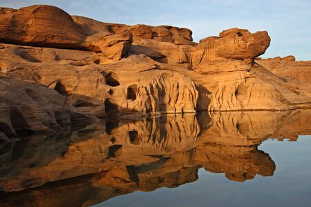 Rocks appearing after neapの写真素材