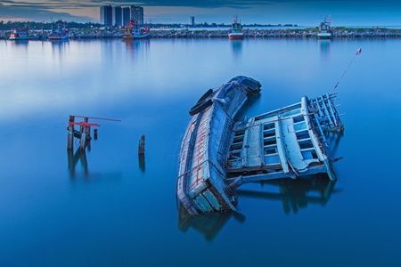 The Sea fishing boat sank at petchaburi province ,Thailandの写真素材