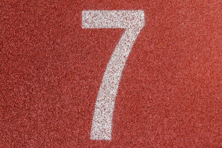  7-Numbers on red running track 