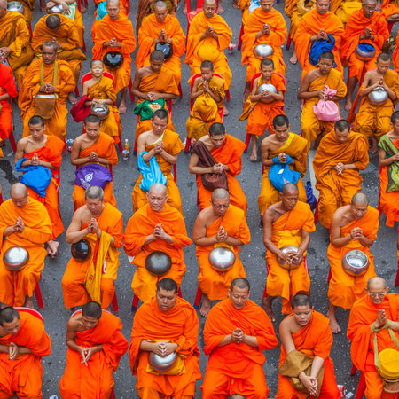 BANGKOK , THAILAND - September 8 : 10,000 Buddhist monks waiting for people give food offerings on...