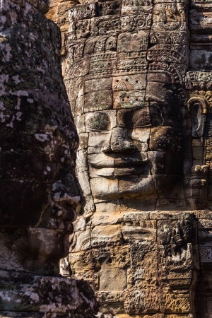Faces of ancient Bayon Castle, Angkor Thom, Cambodia の写真素材