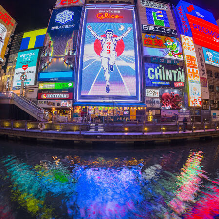 OSAKA, JAPAN - NOV 13: The Glico Man light billboard and other light displays on November 13, 2014 in Dontonbori, Namba Osaka area, Osaka, Japan. Namba is well known as an entertainment area in Osaka.のeditorial素材